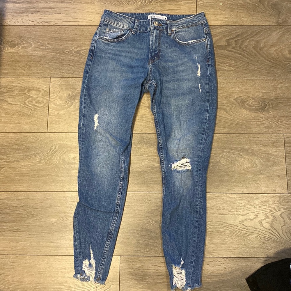 Mid rise distressed jeans